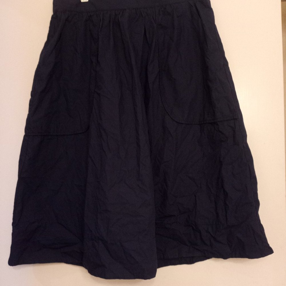 Navy knee length skirt with pockets